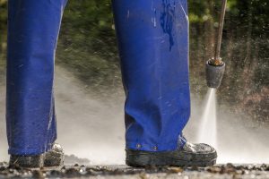 Pressure Washing Pavement Closeup Photo. Cleaning Technologies.